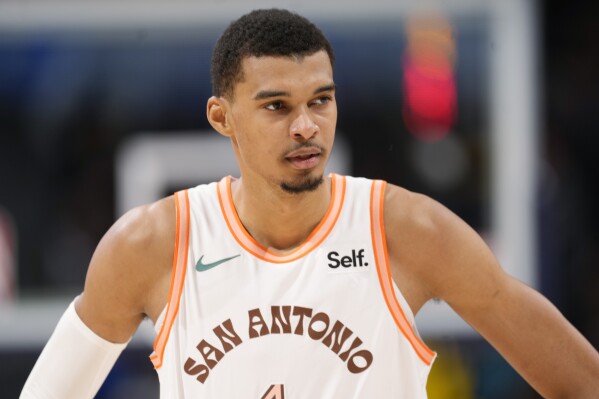 Jokic has near triple double leads Nuggets over Spurs 132 120